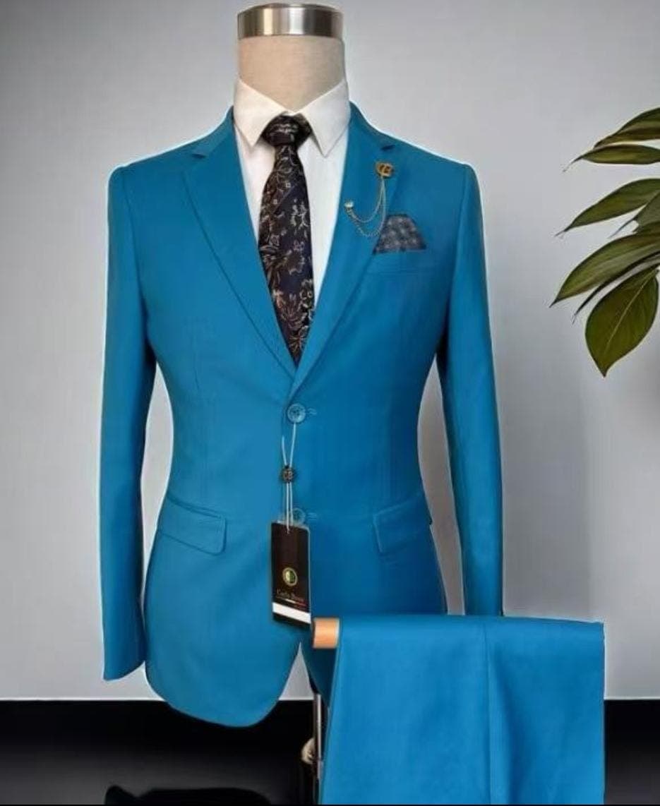 LIGHT BLUE COMPLETE Men Official Suits, 2 buttons, 2 slits, PRICE : Ksh 3800 ( 1 suit) and ksh 3500 (More than 2 suits in bulk). — Royal Threads Enterprise, Kericho